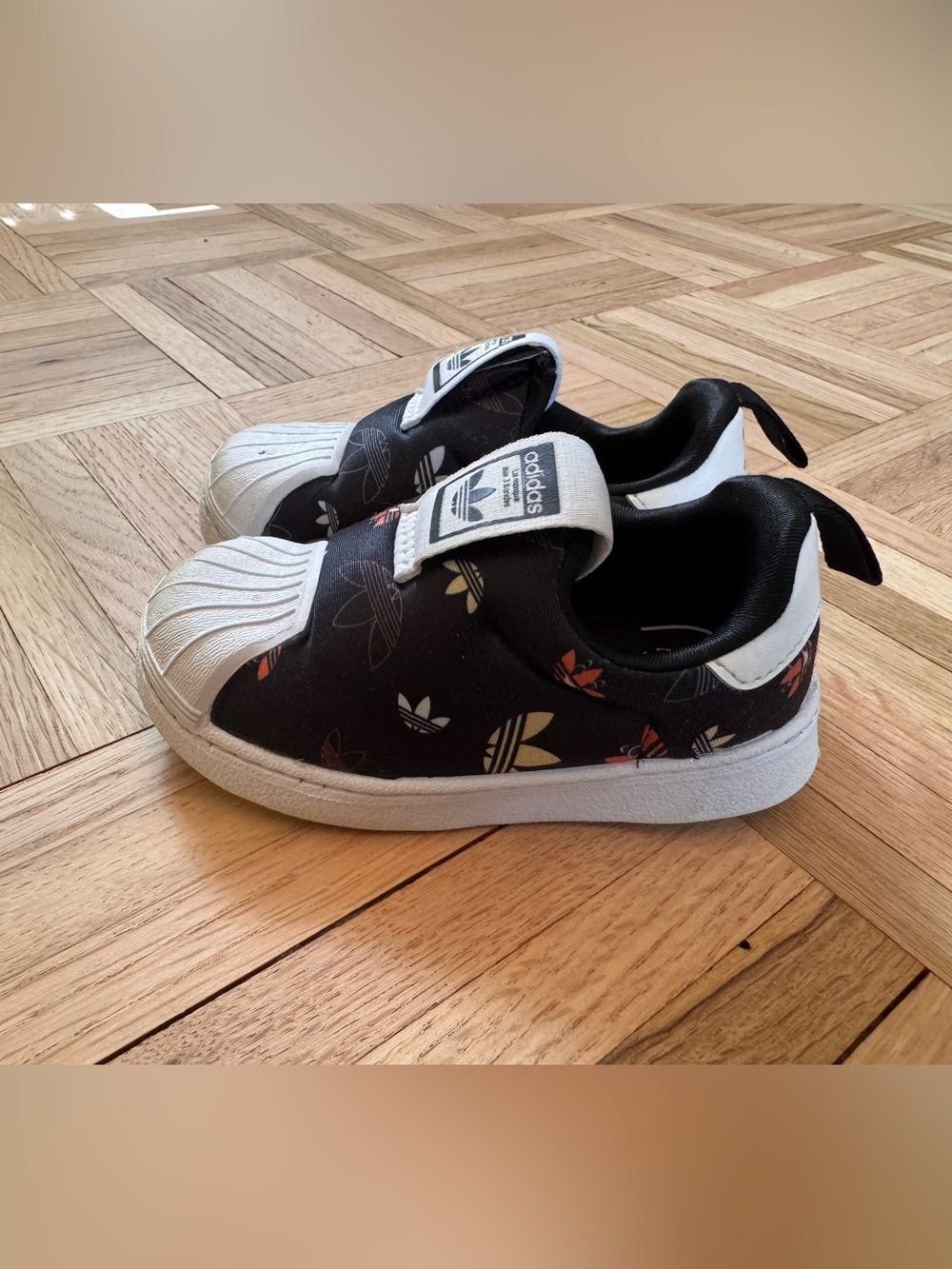 adidas Kids Black Slip-On Shell Toe Sneakers with Multicolor Trefoil Print